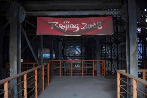 This photo taken on July 23, 2018 shows a faded Beijing 2008 sign in the grandstand of the beach volleyball stadium built for the 2008 Beijing Olympic Games, in Beijing. A decade after Beijing hosted the 2008 Olympics, its legacy remains unmistakable from the smallest alleyways in the Chinese capital to the country's growing clout abroad. For better or worse, the Games changed the face of Beijing: from the iconic Bird's Nest stadium to the countless blocks of ancient homes bulldozed in an Olympic building frenzy.
