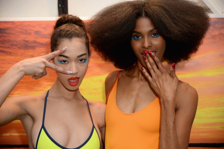 Models pose backstage for Chromat AW18 during New York Fashion Week.