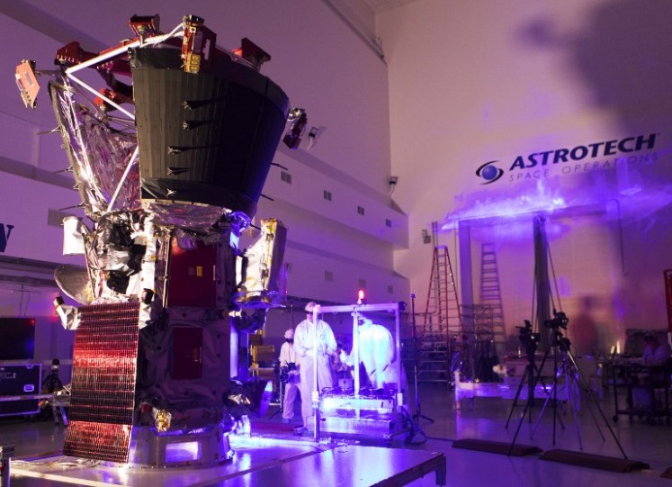 In this image released by NASA, technicians and engineers perform light bar testing on NASA's Parker Solar Probe at the Astrotech processing facility in Titusville, Florida, near NASA's Kennedy Space Center, on June 5, 2018. NASA is poised to launch a $1.5 billion spacecraft on a brutally hot journey toward the Sun, offering scientists the closest-ever view of our strange and mysterious star. After the Parker Solar Probe blasts off from Cape Canaveral, Florida, on August 11, 2018, it will become the first spacecraft ever to fly through the Sun's scorching atmosphere, known as the corona.