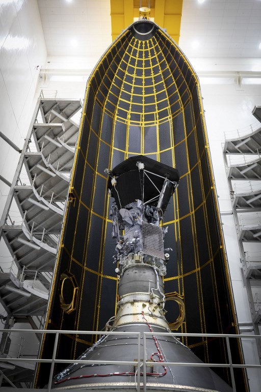 This NASA photo obtained August 1, 2018 shows the Parker Solar Probe one half of its 62.7-foot tall fairing,as the Parker Solar Probe was encapsulated on July 16, 2018, in preparation for the move from Astrotech Space Operations in Titusville, Florida, to Space Launch Complex 37 on Cape Canaveral Air Force Station, where it will be integrated onto its launch vehicle for its launch that is targeted for August 11, 2018. NASA is poised to launch a $1.5 billion spacecraft on a brutally hot journey toward the Sun, offering scientists the closest-ever view of our strange and mysterious star. After the Parker Solar Probe blasts off from Cape Canaveral, Florida, on August 11, 2018, it will become the first spacecraft ever to fly through the Sun's scorching atmosphere, known as the corona.