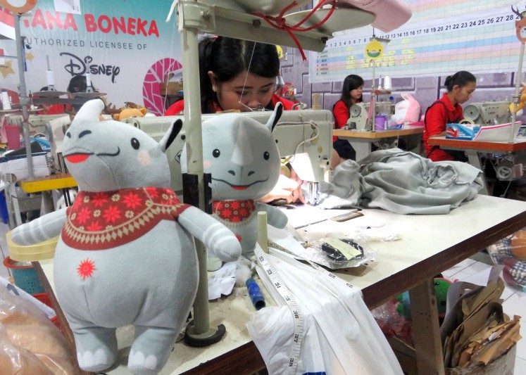Kaka, the one-horned rhino character, one of Asian Games 2018’s three mascots, is at works at the factory.