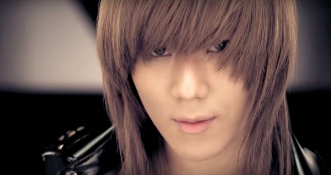 A screenshot of SHINee's 'Lucifer' music video .
