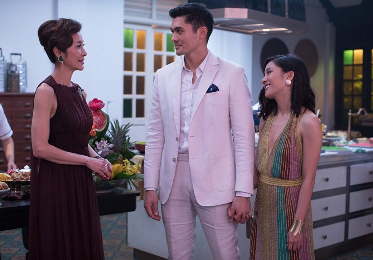 A still from 'Crazy Rich Asians' starring Michelle Yeoh (Eleanor, left), Henry Golding (Nick Young, middle) and Rachel Chu (Constance Wu, right).