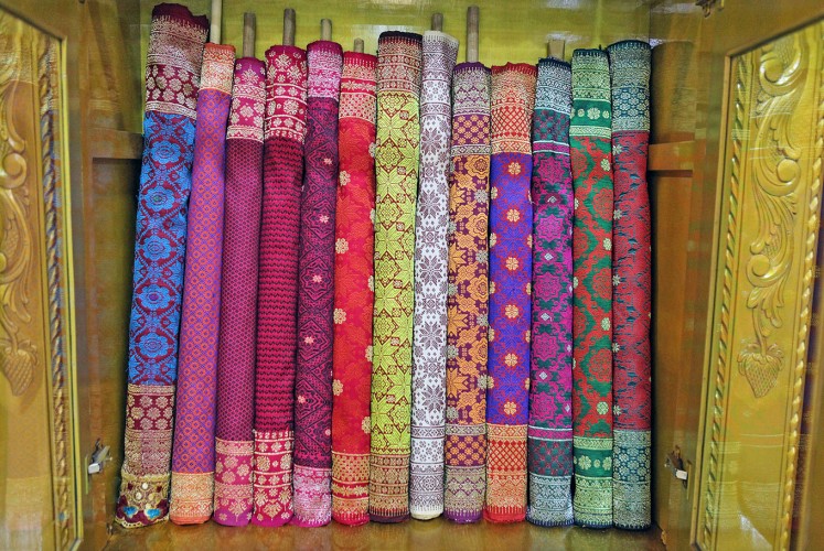 Bright colors: Palembang’s traditional fabric, songket, is a must-have souvenir.