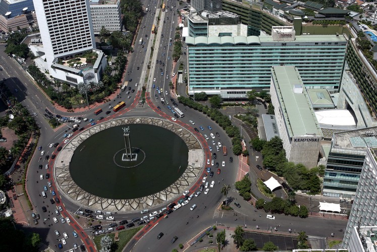 Iconic: An aerial view of the Hotel Indonesia traffic circle features the original Hotel Indonesia complex on the right. The hotel was built to house athletes who competed in the 1962 Asian Games in Jakarta and is still a tourist attraction in the city.