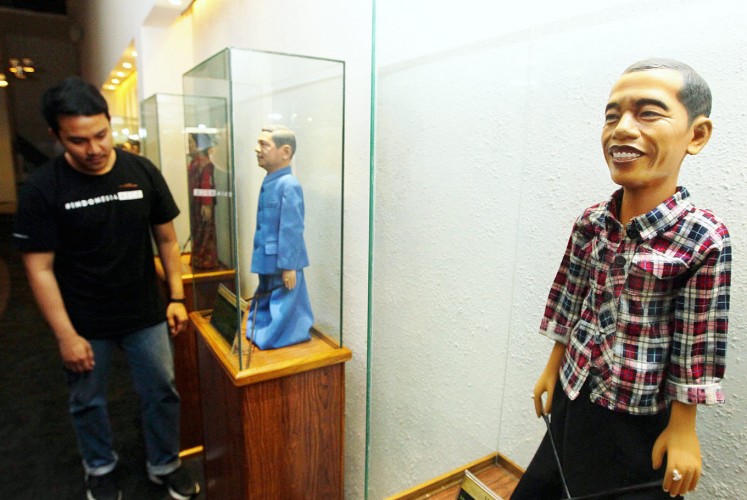Side by side: A realistic puppet of President Joko “Jokowi” Widodo (right) sports his iconic grin and checkered shirt. Next to Jokowi’s puppet is a puppet of his predecessor Susilo Bambang Yudhoyono, whose Democratic Party is one of the largest political parties in Indonesia.