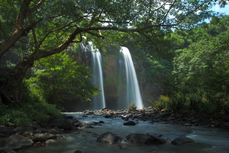The Curug Sodong twin waterfalls at Ciletuh Geopark, Sukabumi.