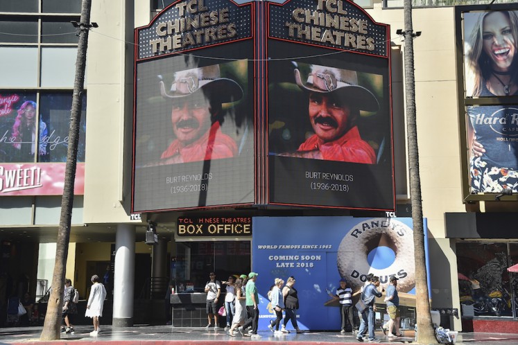 A picture of Burt Reynolds is seen on the TLC Chinese Theatre on the Hollywood walk of fame in Hollywood, California on September 6, 2018