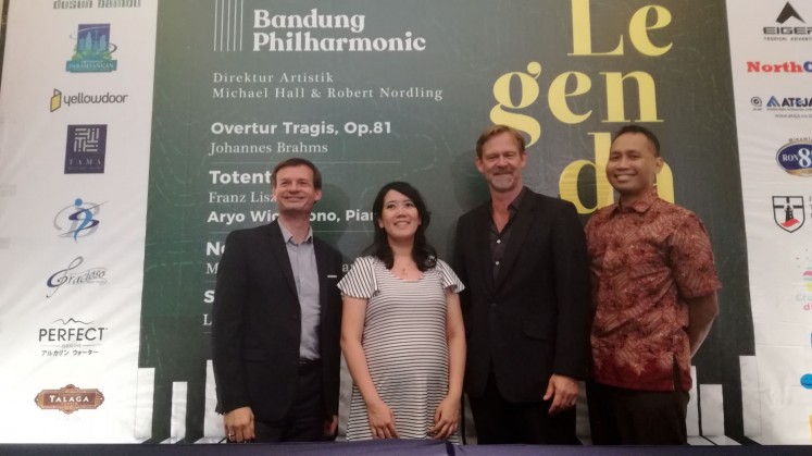 Artistic director of Bandung Philharmonic Michael Hall (from left), composer Marisa Sharon Hartanto, conductor Robert Nordling and pianist Aryo Wicaksono pose for a photo at the press conference of 'Legenda' at the Hilton Hotel Bandung on Thursday