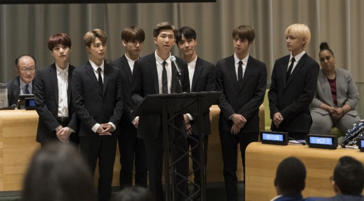K-Pop band BTS speaks during a meeting focused on youth issues at the United Nations in New York on September 24, 2018. K-Pop sensation BTS brought their star power to the United Nations on, telling the world's youth to listen to their inner voice and resist pressure to conform.
Mark GARTEN / AFP