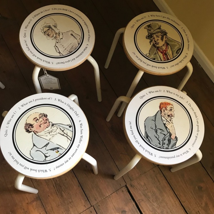 Stools bearing the images of various Dickens characters are some of the items on display at the museum.