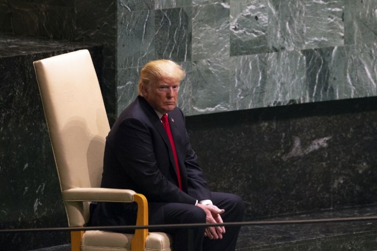 US President Donald Trump sits before speaking at the General Debate of the 73rd session of the General Assembly at the United Nations on September 25, 2018 in New York. 
Bryan R. Smith / AFP