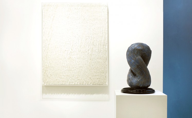 Geometry of nature: The meditative Japanese paper work titled Leiunare #07, Estratum Series (left) by Spanish artist Javier León Pérez resonates with Whorl, a coiled feather sculpture by British artist Kate MccGwire.