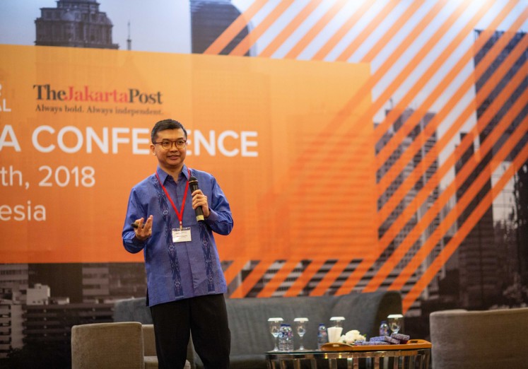 Euromonitor International research manager Adhitya Nugroho speaks when delivering a report on Indonesia consumer behavior at the Euromonitor International conference in Jakarta on Sept. 25.