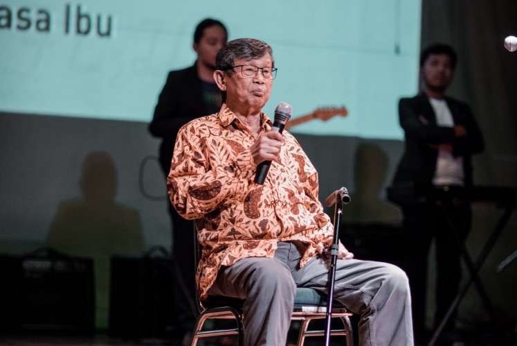 Ajip Rosidi talks on stage during the awarding night of the Rancagé Literary Awards at Taman Ismail Marzuki in Central Jakarta on Wednesday.