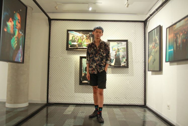 Nathanael Moss in front of his 'Suck Party' fashion editorial. The photos were shot in places that symbolize Jakarta, including Mangga Besar, West Jakarta. 