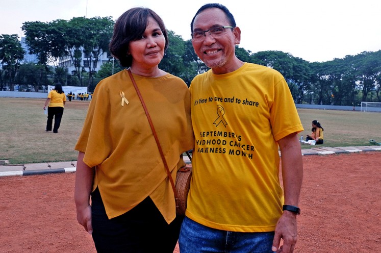 Taking action: Indonesian Anyo Foundation (YAI) founder Sabar Manullang (right) poses with his wife, Pinta Manullang-Panggabean. 