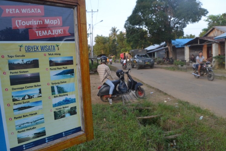 Information for tourists is displayed at the entrance to Temajuk village, Paloh district, Sambas regency, West Kalimantan.