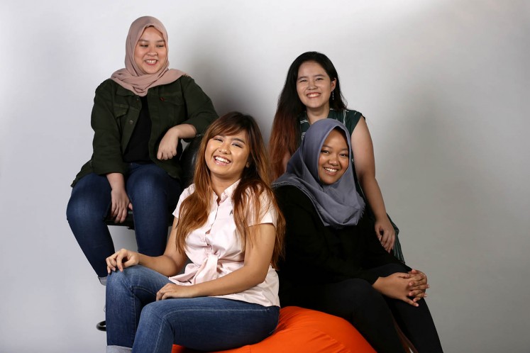 Four Binus University International students behind 'The Living Wall' project at their campus; Nazira Muqthadi (above left), Yosephine Claudia Chandra (above right), Amanda Lydia (below left) and Zahra Fortuna (below right) at The Jakarta Post studio on Oct. 11.