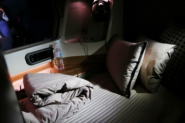 Business Class seats can be turned into beds. 