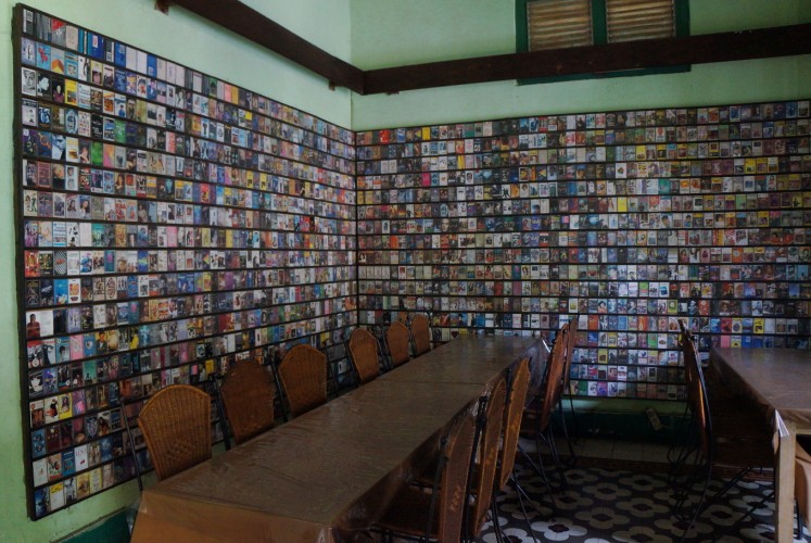 A room at Inggil in Malang, East Java, that has old cassette tapes on its walls. 