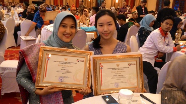Yayasan Inisiatif Peduli Bangsa (Indonesia for Refugees) founder Cassia Tandiono (right) is among the awardees on Monday, Oct. 29.