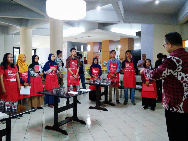 IPB rector Arif Satria welcomes students to Sekolah Kopi. 