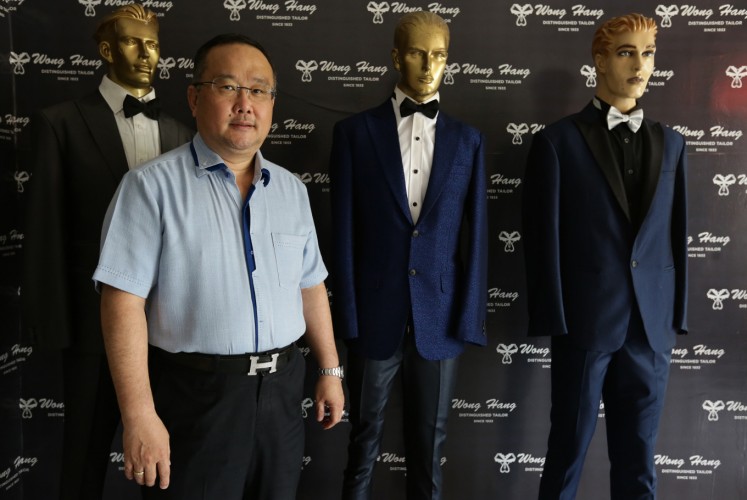 Peter Wongso, owner and one of the designers of Wong Hang Tailor, is pictured at the Wong Hang Tailor outlet in South Jakarta on Nov. 19.