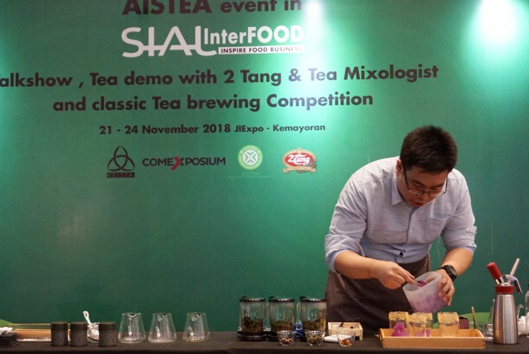 Adrianus Kurniawan competes in the Indonesia Tea Brewing Competition on Saturday, Nov. 24, at JIEXpo Kemayoran, Central Jakarta.