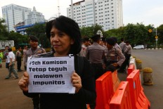 Activists push for independent team to solve Munir's death