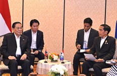 Jokowi conveys words of wisdom to new ASEAN chair Laos
