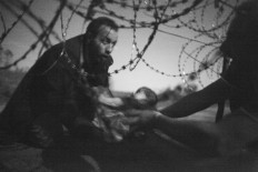 Australian wins World Press Photo for migrants image