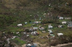 Death toll from Fiji cyclone hits 18 as aid sent to islands