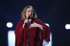 Chart-topping Adele gets emotional with big Brit Awards win 