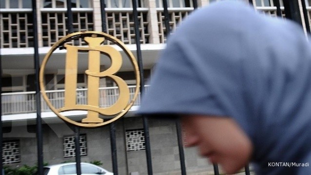 A woman walks past Bank Indonesia (BI). The central bank has has launched regulation to provide a hedging facility for Islamic banks, to mitigate potential losses due to exchange rate fluctuations.