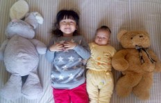 Li Shuchun, 4, and his 7-month-old brother Li Shuhan, live in Beijing with their parents who are among the 1.07 million out of 11 million eligible couples applied to have a second child by the end of last year.