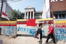 Scrap local govt nuisance permits, Jokowi demands