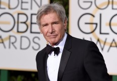 Harrison Ford says he was distracted when he flew over plane