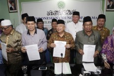 Police halt gay wedding ceremony in Central Java