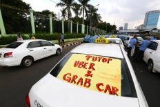 Jakarta administration threatens to revoke permits of companies whose cabbies were involved in violence 