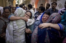 Family members of Pakistani Christian boy Sahil Pervez, mourn his death, in Lahore, Pakistan, Monday, March 28, 2016. The death toll from a massive suicide bombing targeting Christians gathered on Easter in the eastern Pakistani city of Lahore rose on Monday as the country started observing a three-day mourning period following the attack. AP/B.K. Bangash