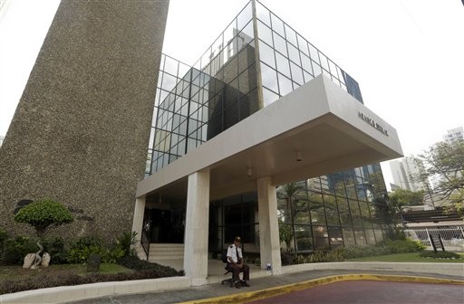 A security guard sit outside the Mossack Fonseca law firm in Panama City, April 3.