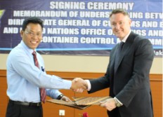 Director of Enforcement and Investigation Muhammad Sigit (left) accepts the signature of UNODC Regional Representative, Jeremy Douglas on behalf of the direthe Directorate General of Customs and Excise in this file photo.
