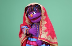 In this Wednesday, April 6, 2016 photo, Sesame Street's new Afghan character, a sassy, fun 6-year-old Afghan puppet girl called Zari takes part in a recording session ahead of her television debut on Afghanistan's local production of the show in Kabul, Afghanistan. Zari - whose name means “shimmering” in Afghanistan’s two official languages, Dari and Pashtu - made her debut on Thursday on the fifth season of Afghanistan’s local production of the show called Baghch-e-Simsim, which translates as Sesame Garden. 