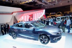 Astra posts profit despite slump in car sales