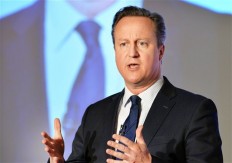 Then-prime minister David Cameron speaks at the Conservative party's spring forum in central London, April 9, 2016.