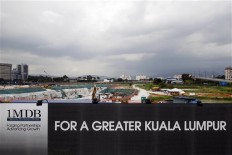 Malaysian online news portal chief charged over videos 