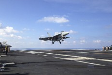 SOUTH CHINA SEA WATCH: US, China build up presence, rhetoric