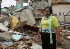 A woman cries as she stands next to house destroyed by the earthquake in the Pacific coastal town of Pedernales, Ecuador, Sunday, April 17, 2016. The strongest earthquake to hit Ecuador in decades flattened buildings and buckled highways along its Pacific coast, sending the Andean nation into a state of emergency. As rescue workers rushed in, officials said Sunday at least 77 people were killed, over 570 injured and the damage stretched for hundreds of miles to the capital and other major cities. AP Photo/Dolores Ochoa