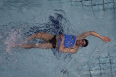 Still swimming in exile, Syrian refugee to carry Rio flame